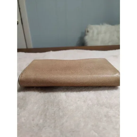 Coach metallic leather, tan, gold-toned clasp clutch, NWOT